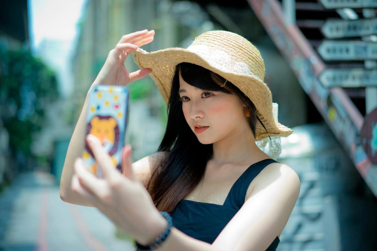 woman wearing brown summer hat